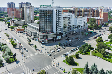 Image showing Office building with shops on crossroads. Tyumen