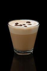 Image showing coffe latte cup on the black background