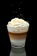 Image showing coffe latte cup on the black background
