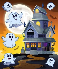 Image showing Ghosts flying around haunted house