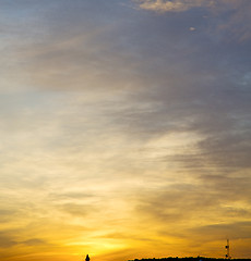 Image showing light  the sunrise in  colored sky white soft clouds and abstrac