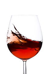 Image showing moving red wine glass