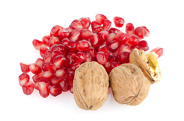 Image showing Pomegranate seed pile and nuts