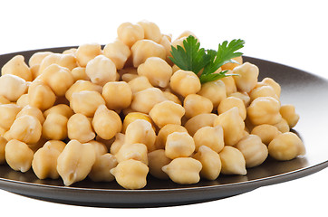 Image showing Chickpeas in a brown plate