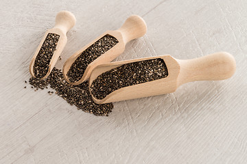 Image showing Chia seeds in wooden scoops