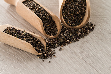 Image showing Chia seeds in wooden scoops