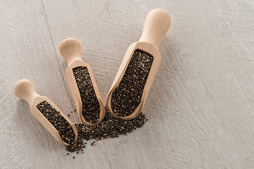 Image showing Chia seeds in wooden scoops