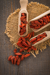 Image showing Goji berries on a wooden spoons