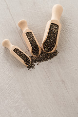 Image showing Chia seeds in wooden scoops