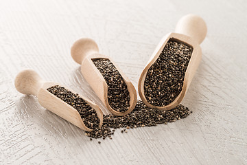 Image showing Chia seeds in wooden scoops