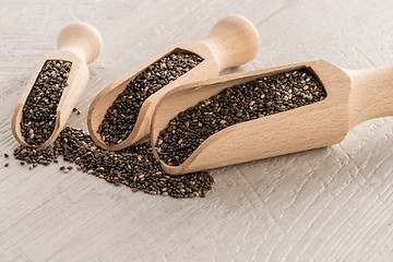 Image showing Chia seeds in wooden scoops