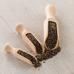 Image showing Chia seeds in wooden scoops