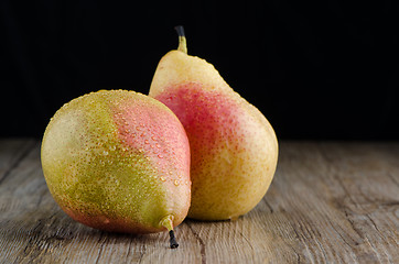 Image showing Pears in a old wooden table