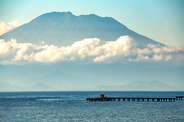 Image showing view on Bali from ocean, vulcano in clouds