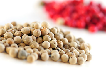 Image showing Red and white peppercorns