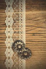 Image showing vintage button and lace tape