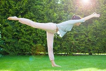 Image showing beautiful adult woman doing yoga