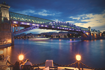 Image showing night cityscape of Moscow with river and illumination bridge And