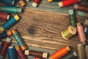 Image showing Vintage spools with colored threads