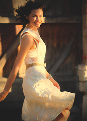 Image showing beautiful middle-aged woman in a summer dress