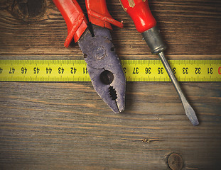 Image showing vintage pliers and old screwdriver