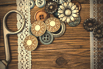Image showing vintage buttons, lace, and a tailor scissors