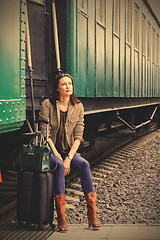 Image showing beautiful middle-aged woman traveling in a retro style