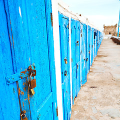 Image showing in africa morocco  old harbor wood   door and the blue sky