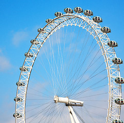 Image showing london eye in the spring sky and white clouds