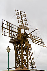 Image showing hole windmills in  isle of   spain   and the sky 