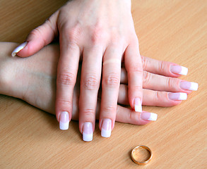 Image showing Female hands after a divorce