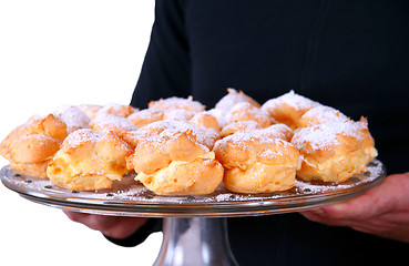 Image showing Serving delicious cakes on a plate