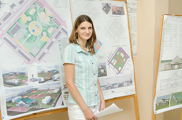 Image showing Happy student standing at the graduation project