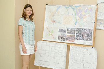 Image showing She is a student at the graduation project