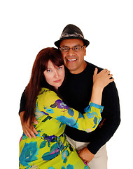 Image showing Woman hugging her Hispanic man.