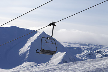 Image showing Chair lift and mountains in evening