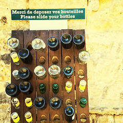 Image showing Empty bottles rack