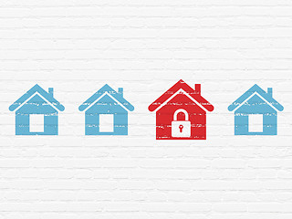 Image showing Safety concept: home icon on wall background