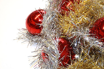 Image showing red baubles and tinsel
