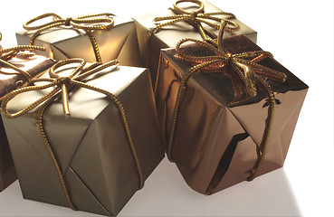 Image showing five bronze presents