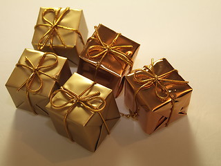 Image showing five gold presents