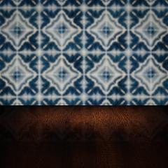 Image showing Wood table top and blur vintage ceramic tile pattern wall