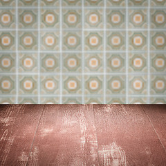 Image showing Wood table top and blur vintage ceramic tile pattern wall