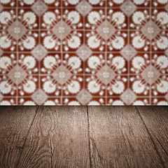 Image showing Wood table top and blur vintage ceramic tile pattern wall