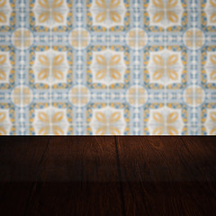 Image showing Wood table top and blur vintage ceramic tile pattern wall