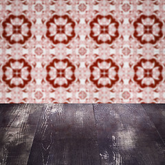 Image showing Wood table top and blur vintage ceramic tile pattern wall