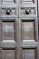 Image showing in london antique brown door   and light