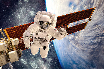 Image showing International Space Station and astronaut.