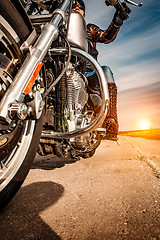 Image showing Biker girl riding on a motorcycle