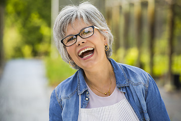 Image showing Mature woman laughing